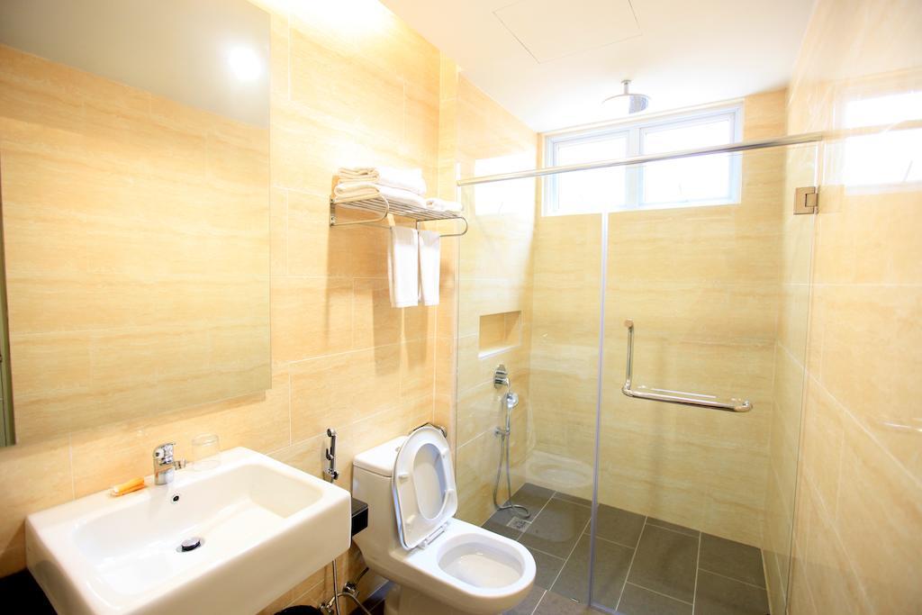 Merdeka Suites Hotel Мірі Номер фото