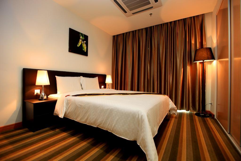 Merdeka Suites Hotel Мірі Номер фото