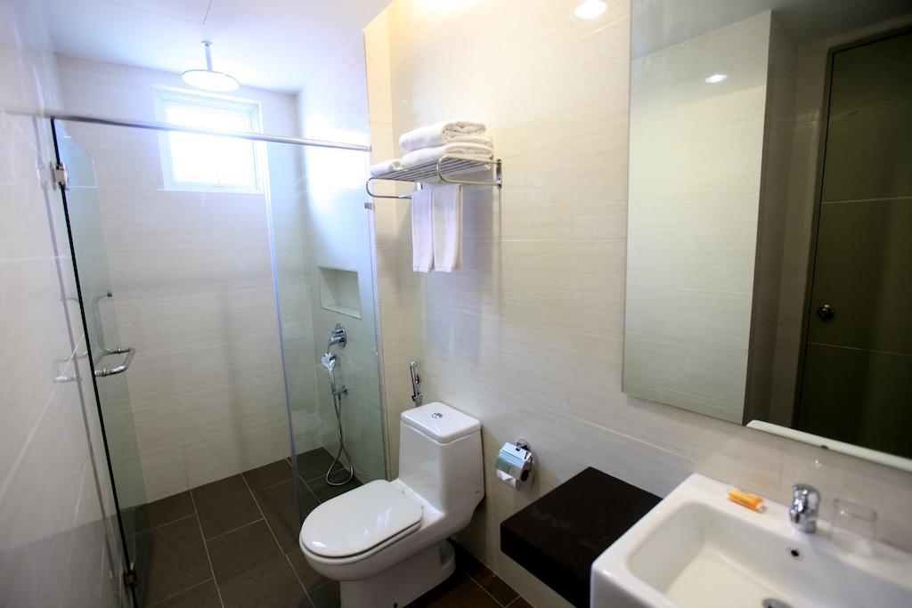 Merdeka Suites Hotel Мірі Номер фото